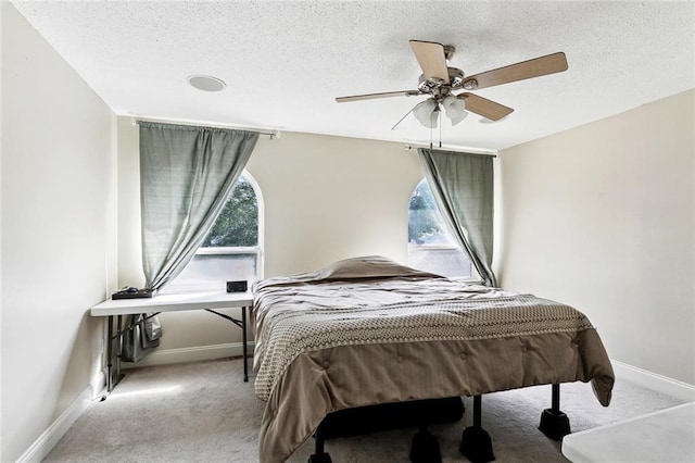 9108 Ormond Pl, River Ridge, LA 70123 - bedroom with carpet flooring, baseboards, ceiling fan, and a textured ceiling