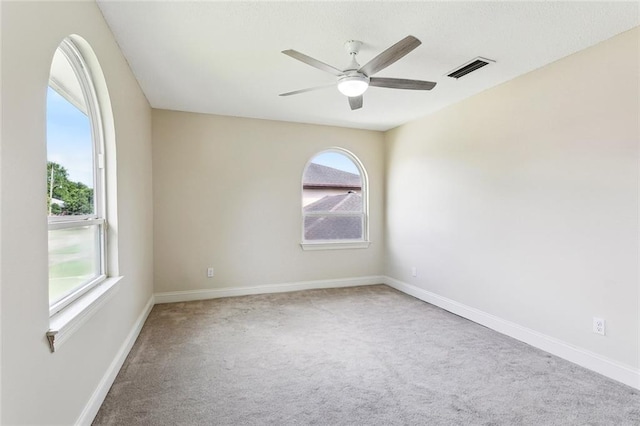 9108 Ormond Pl, River Ridge, LA 70123 - carpeted spare room with plenty of natural light, baseboards, and a ceiling fan