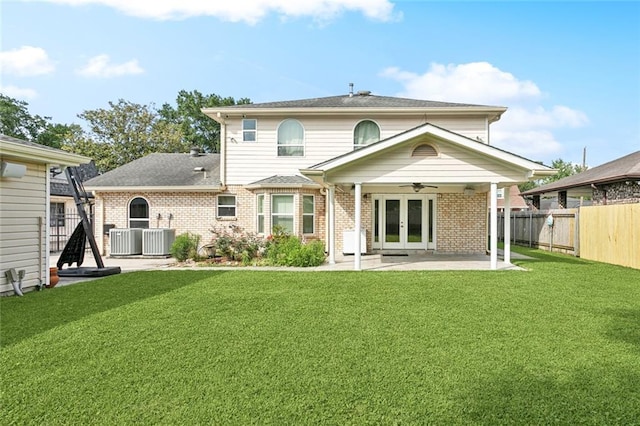 9108 Ormond Pl, River Ridge, LA 70123 - back of property with french doors, a ceiling fan, a patio, brick siding, and central AC