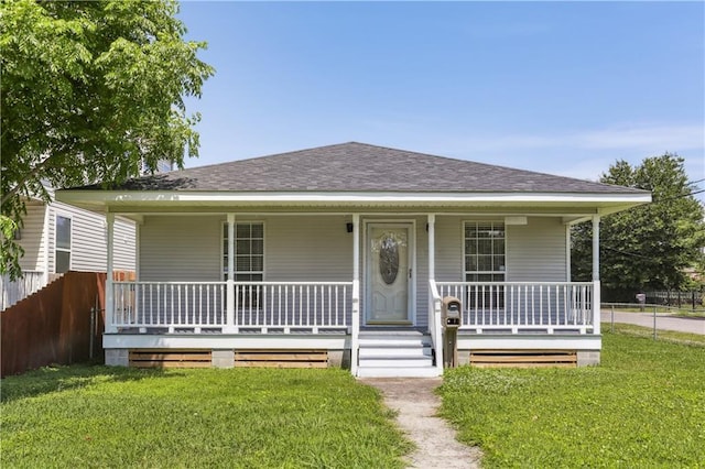 1401 Claiborne Dr, Jefferson, LA 70121 - view of front of house with a porch and a shingled roof