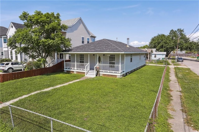 1401 Claiborne Dr, Jefferson, LA 70121 - view of front of home with a porch and a shingled roof