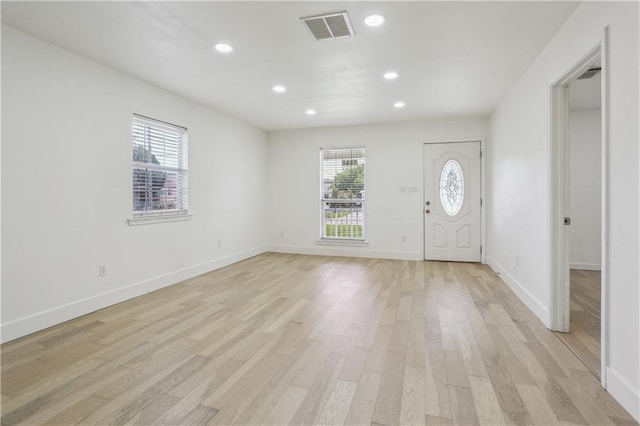 1401 Claiborne Dr, Jefferson, LA 70121 - foyer featuring light wood-style floors, plenty of natural light, recessed lighting, and baseboards