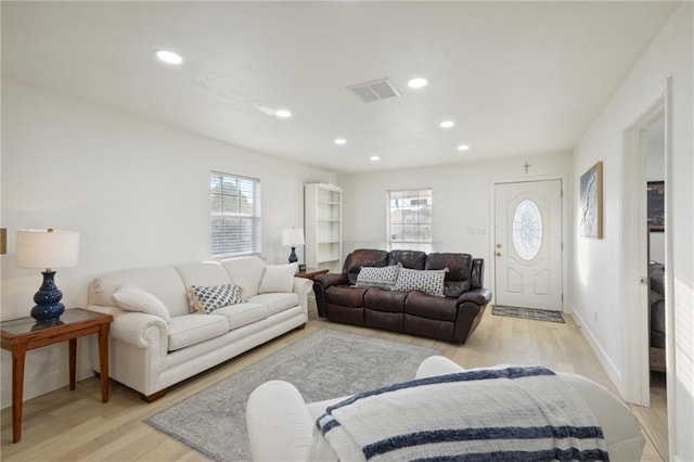 1401 Claiborne Dr, Jefferson, LA 70121 - living room featuring light wood-style floors, recessed lighting, and baseboards