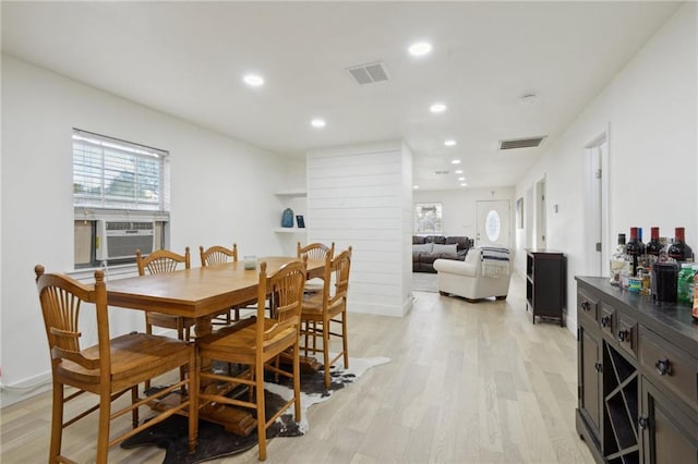 1401 Claiborne Dr, Jefferson, LA 70121 - dining room featuring cooling unit, recessed lighting, and light wood-style floors