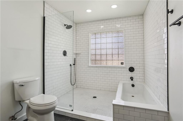 1401 Claiborne Dr, Jefferson, LA 70121 - full bath with toilet, a tile shower, recessed lighting, tiled tub, and tile patterned flooring