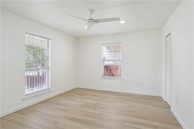 1401 Claiborne Dr, Jefferson, LA 70121 - spare room with healthy amount of natural light, light wood finished floors, a ceiling fan, baseboards, and recessed lighting