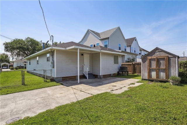 1401 Claiborne Dr, Jefferson, LA 70121 - view of property exterior with entry steps, an outbuilding, and a storage unit