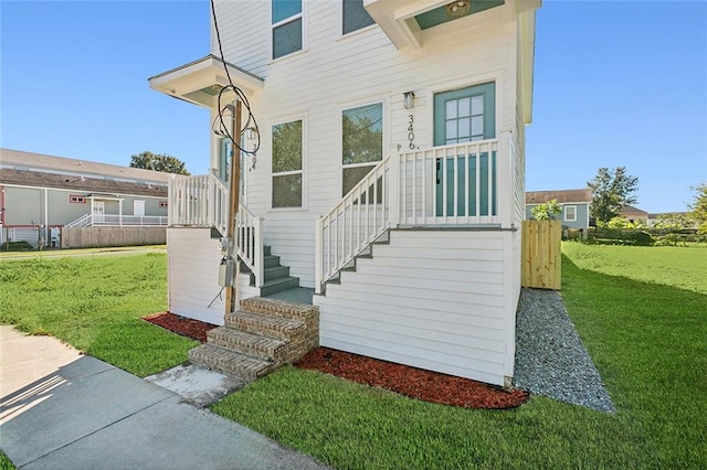 340606 Jackson Ave, New Orleans, LA 70125 - doorway to property featuring a lawn