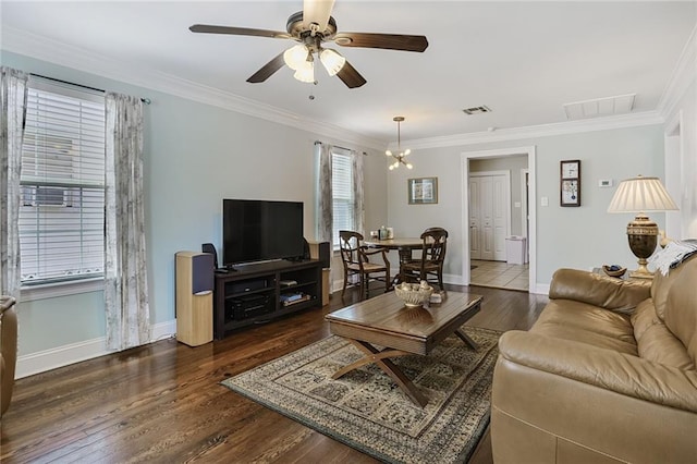 309 Wallace Dr, New Orleans, LA 70122 - living area with a ceiling fan, crown molding, dark wood finished floors, and baseboards