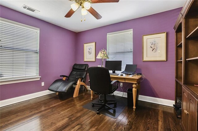 309 Wallace Dr, New Orleans, LA 70122 - office with a ceiling fan, wood finished floors, and baseboards