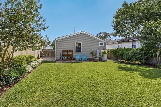 309 Wallace Dr, New Orleans, LA 70122 - rear view of property featuring a patio area