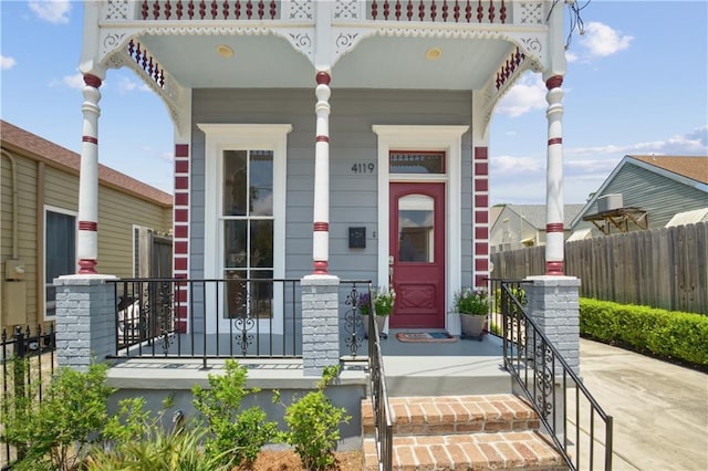 4119 S Liberty St, New Orleans, LA 70115 - property entrance with covered porch and fence