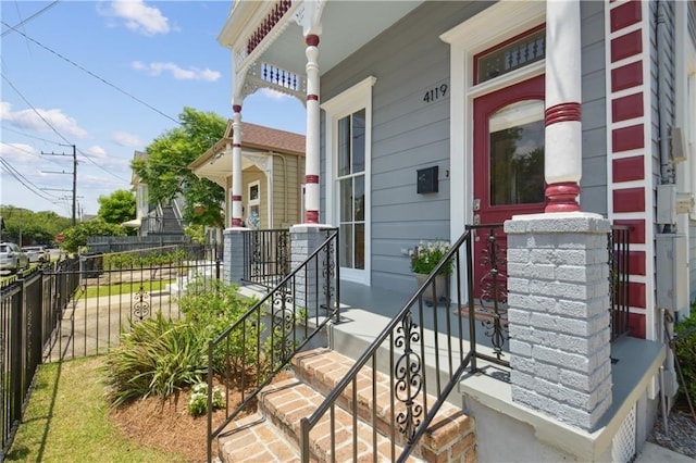 4119 S Liberty St, New Orleans, LA 70115 - entrance to property featuring a porch and fence