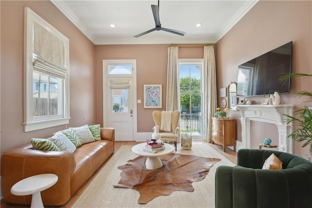 4119 S Liberty St, New Orleans, LA 70115 - living room featuring plenty of natural light, ornamental molding, ceiling fan, wood finished floors, and recessed lighting