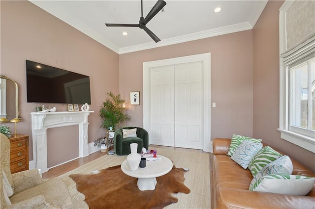 4119 S Liberty St, New Orleans, LA 70115 - living room featuring wood finished floors, crown molding, a ceiling fan, and recessed lighting