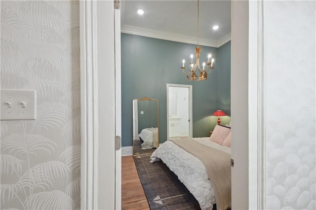 4119 S Liberty St, New Orleans, LA 70115 - bedroom featuring wood finished floors, a chandelier, ornamental molding, recessed lighting, and baseboards