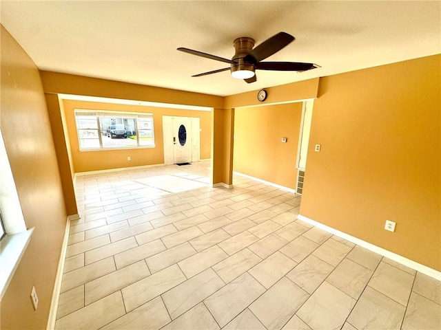 1523 W Dr, Westwego, LA 70094 - empty room featuring ceiling fan and baseboards