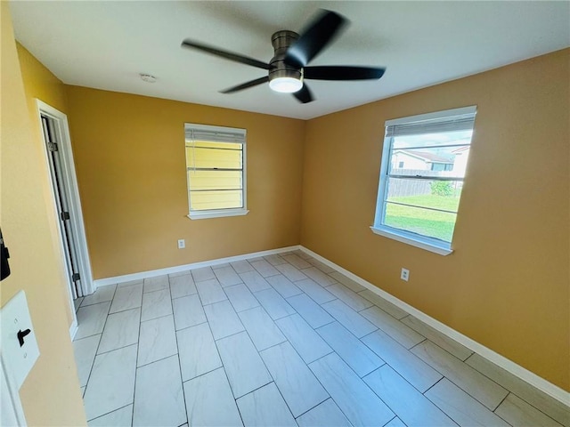 1523 W Dr, Westwego, LA 70094 - empty room with ceiling fan and baseboards