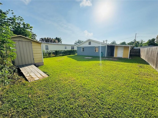1523 W Dr, Westwego, LA 70094 - view of yard with a storage shed and an outbuilding
