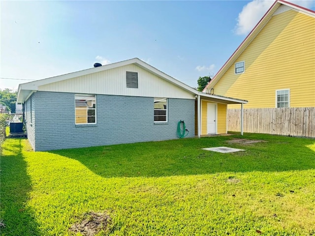 1523 W Dr, Westwego, LA 70094 - back of house with brick siding and central AC