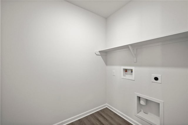 clothes washing area featuring hookup for a washing machine, dark wood-type flooring, baseboards, and electric dryer hookup
