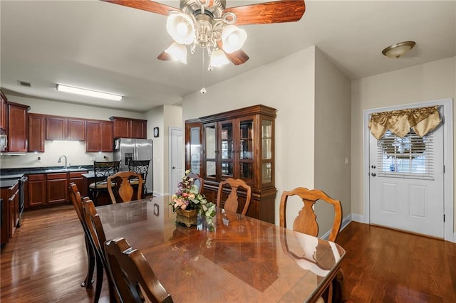 40145 Taylor Trl Unit 503, Slidell, LA 70461 - dining room with ceiling fan, dark wood finished floors, and baseboards