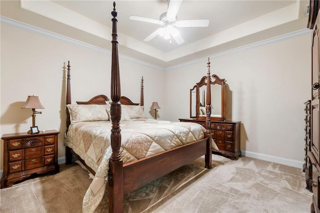 40145 Taylor Trl Unit 503, Slidell, LA 70461 - bedroom with light colored carpet, a tray ceiling, baseboards, ceiling fan, and ornamental molding