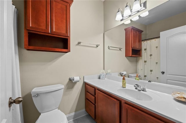 40145 Taylor Trl Unit 503, Slidell, LA 70461 - full bathroom with toilet, vanity, and baseboards