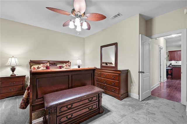 40145 Taylor Trl Unit 503, Slidell, LA 70461 - bedroom with light colored carpet, baseboards, and ceiling fan