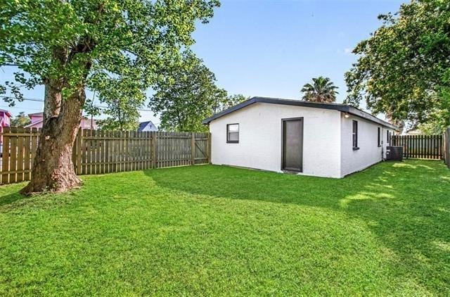 1444 Egania St, New Orleans, LA 70117 - view of yard featuring central AC unit