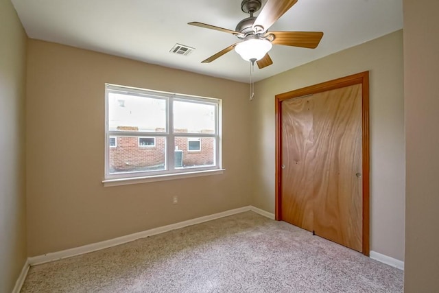 3233 Duncan St, Slidell, LA 70458 - unfurnished bedroom with carpet flooring, a closet, baseboards, and ceiling fan
