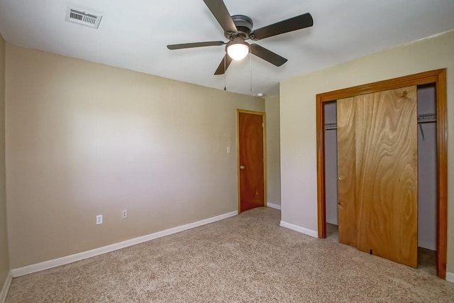 3233 Duncan St, Slidell, LA 70458 - unfurnished bedroom with carpet floors, a closet, baseboards, and a ceiling fan