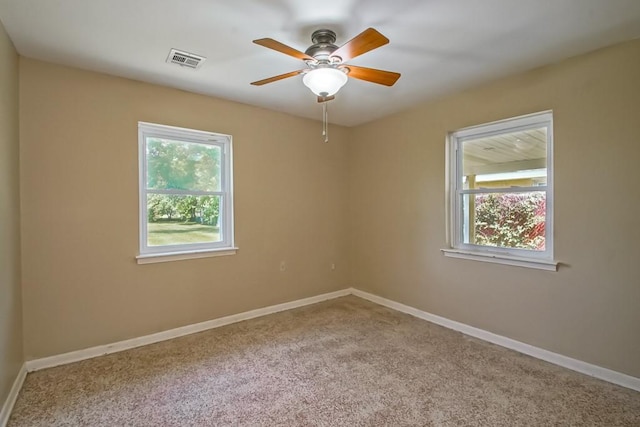 3233 Duncan St, Slidell, LA 70458 - unfurnished room with a ceiling fan, carpet floors, and baseboards