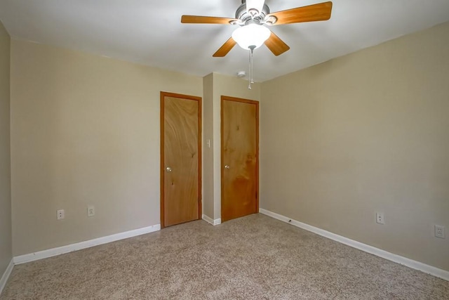 3233 Duncan St, Slidell, LA 70458 - spare room featuring baseboards, a ceiling fan, and carpet floors