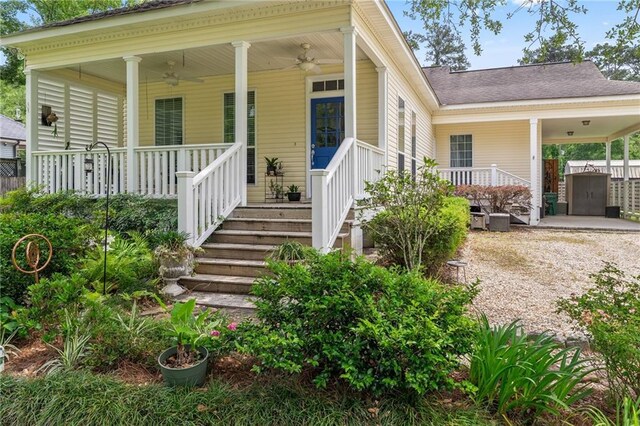 22236 8th St, Abita Springs, LA 70420 - view of front facade with driveway, a porch, and an attached carport