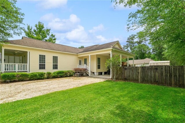 22236 8th St, Abita Springs, LA 70420 - view of front of house featuring a ceiling fan and covered porch