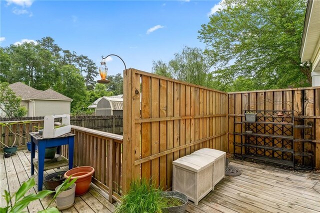 22236 8th St, Abita Springs, LA 70420 - wooden deck with a fenced backyard