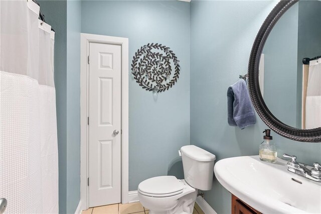 22236 8th St, Abita Springs, LA 70420 - carpeted bedroom featuring baseboards and a ceiling fan