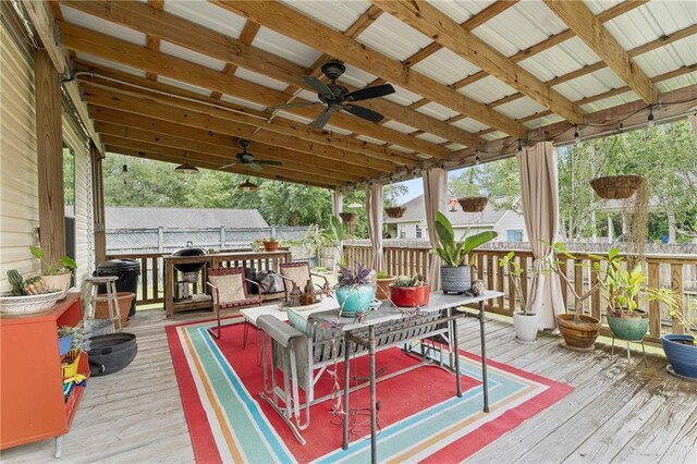 22236 8th St, Abita Springs, LA 70420 - deck with a ceiling fan and outdoor dining space