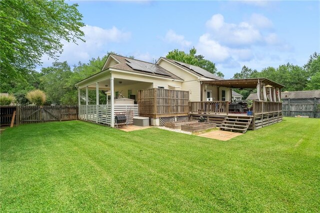 22236 8th St, Abita Springs, LA 70420 - wooden deck featuring outdoor dining area and a ceiling fan