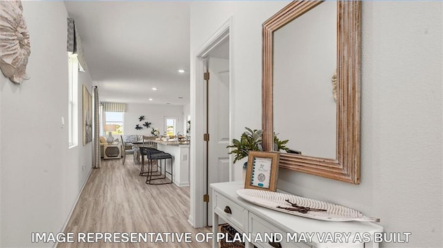 311 Holmes Blvd, Terrytown, LA 70056 - corridor featuring light wood-style floors and recessed lighting
