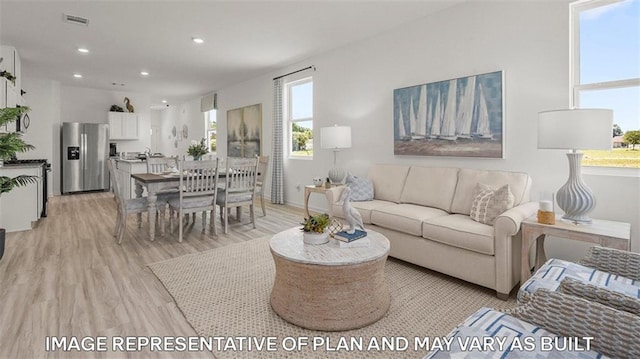 311 Holmes Blvd, Terrytown, LA 70056 - living area featuring light wood-type flooring and recessed lighting