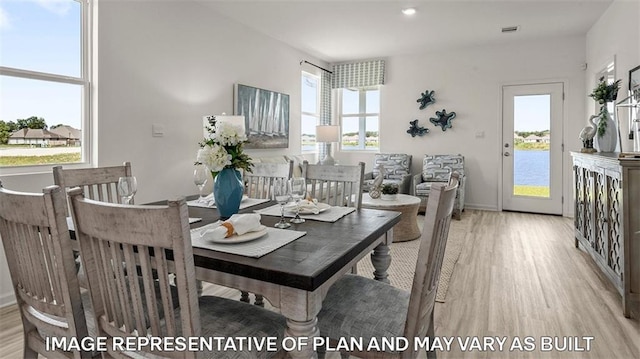 311 Holmes Blvd, Terrytown, LA 70056 - dining space featuring light wood-type flooring and baseboards