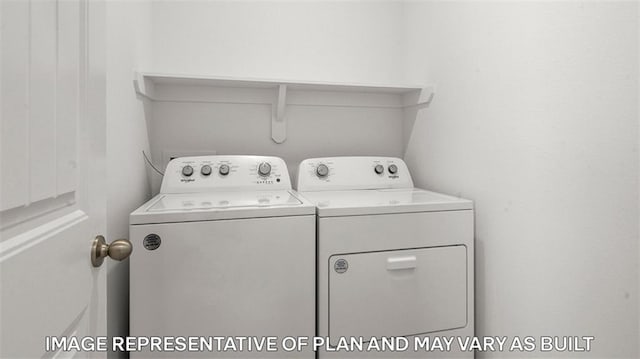 311 Holmes Blvd, Terrytown, LA 70056 - laundry area featuring washing machine and clothes dryer