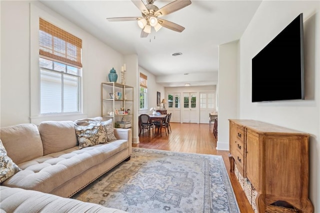 317 Henry Clay Ave, New Orleans, LA 70118 - living room featuring light wood-type flooring and a ceiling fan