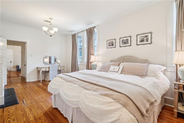317 Henry Clay Ave, New Orleans, LA 70118 - bedroom with ornamental molding, wood finished floors, and a chandelier