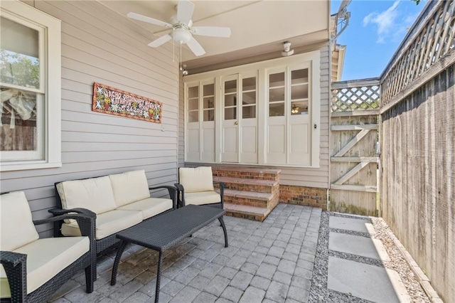 317 Henry Clay Ave, New Orleans, LA 70118 - view of patio featuring ceiling fan, outdoor lounge area, and fence