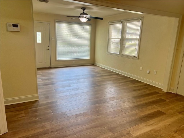 817 N Sibley St, Metairie, LA 70003 - interior space with baseboards, ceiling fan, and wood finished floors