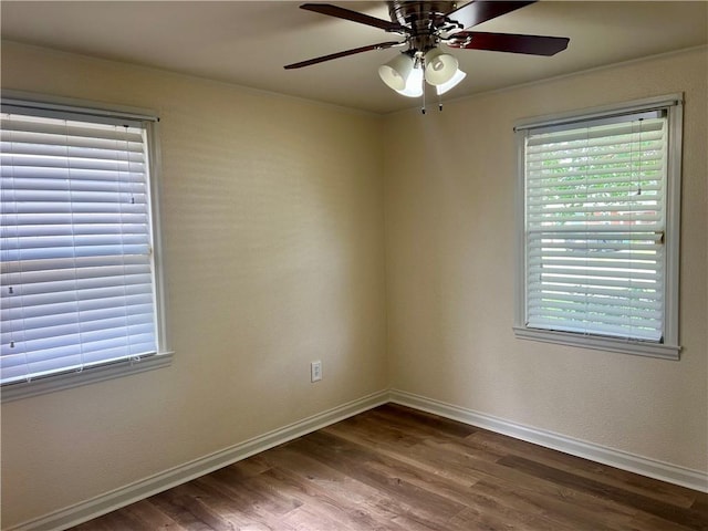 817 N Sibley St, Metairie, LA 70003 - spare room with a ceiling fan, wood finished floors, and healthy amount of natural light