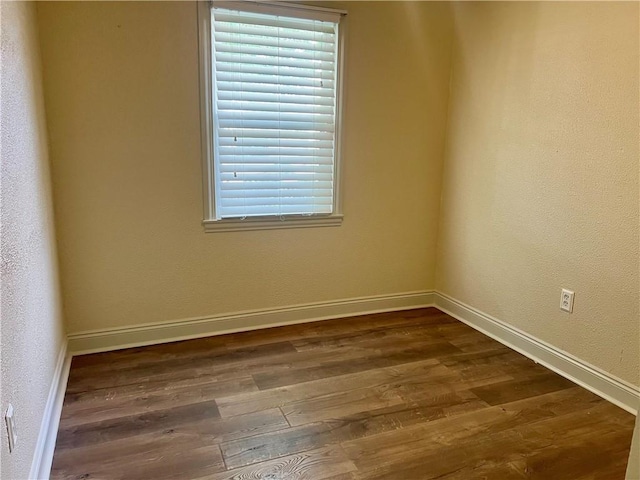 817 N Sibley St, Metairie, LA 70003 - unfurnished room featuring dark wood-style flooring and baseboards